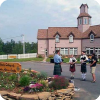 Pipers perform in front of the Gaelic College of Celtic Arts and Crafts